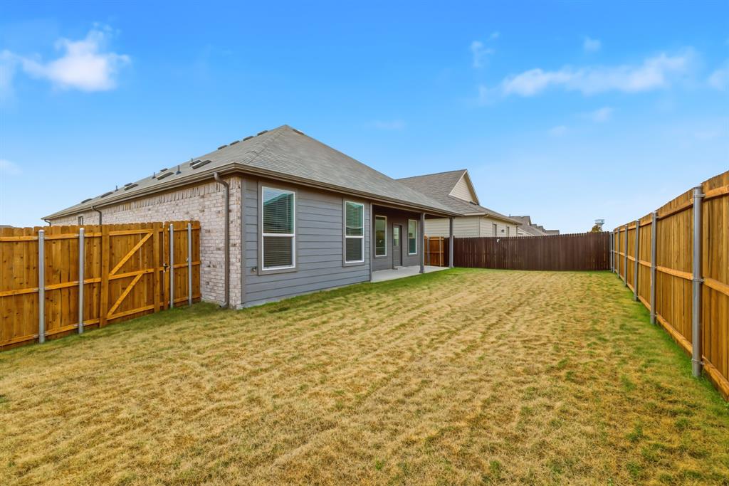 4916 Ascot Way Princeton, TX 75407 - Photo 33 of 39 a view of a house with backyard