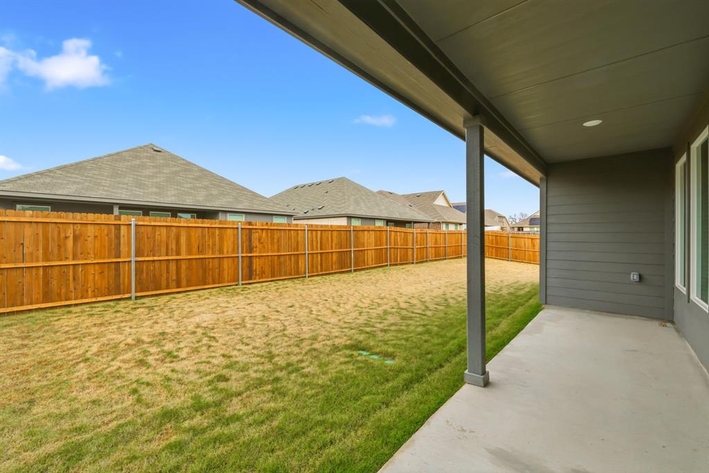 4916 Ascot Way Princeton, TX 75407 - Photo 34 of 39 a view of an empty room with a ocean view