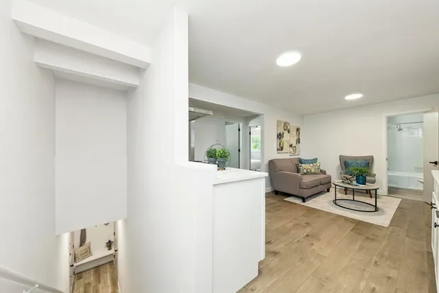 a living room with furniture and a table