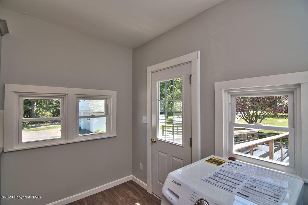 362 Upper Swiftwater Road Cresco, PA 18326 - Photo 22 of 87 a bedroom with a window and bed