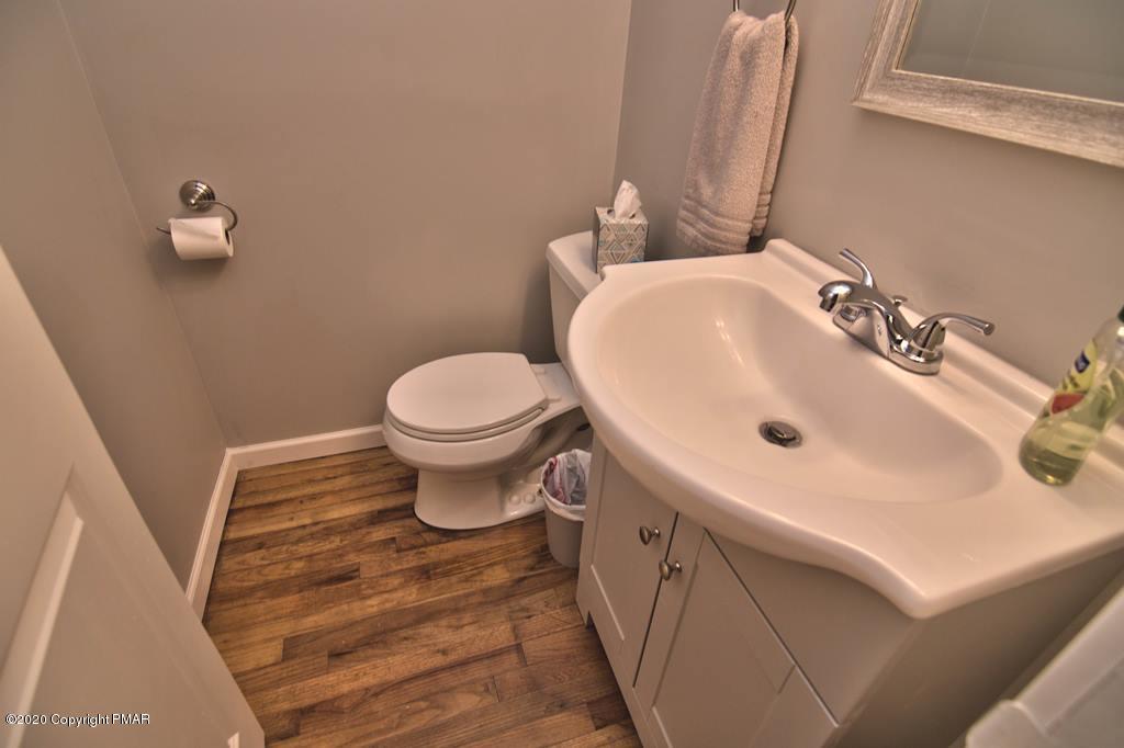362 Upper Swiftwater Road Cresco, PA 18326 - Photo 30 of 87 a bathroom with a sink and a toilet