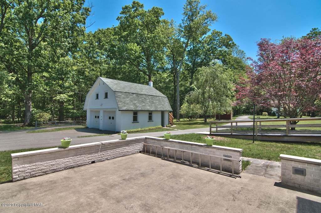 362 Upper Swiftwater Road Cresco, PA 18326 - Photo 53 of 87 an outdoor view of house with yard