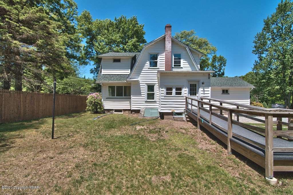 362 Upper Swiftwater Road Cresco, PA 18326 - Photo 56 of 87 a front view of a house with a yard