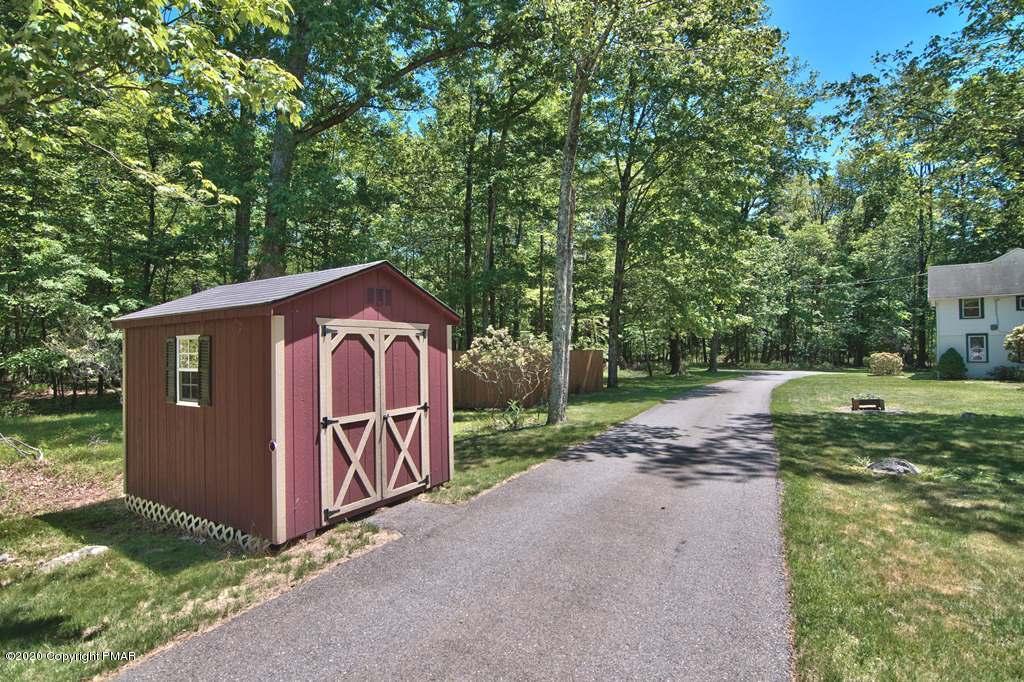 362 Upper Swiftwater Road Cresco, PA 18326 - Photo 61 of 87 a view of a barn with a small yard