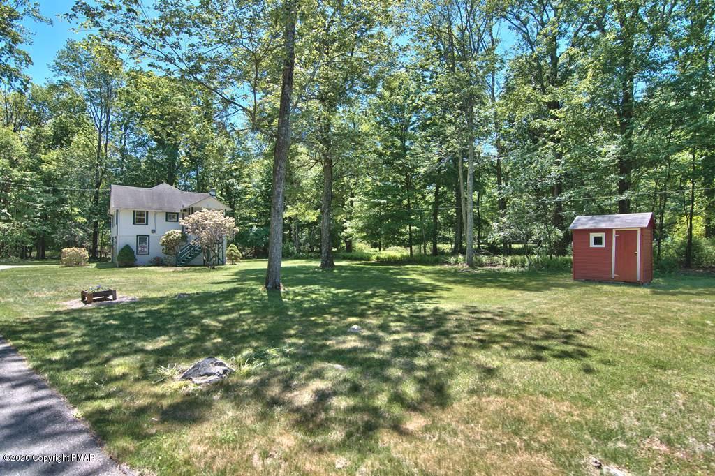 362 Upper Swiftwater Road Cresco, PA 18326 - Photo 62 of 87 a backyard of a house with lots of green space
