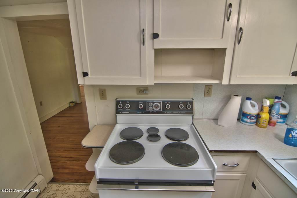362 Upper Swiftwater Road Cresco, PA 18326 - Photo 83 of 87 a kitchen with a stove and a microwave