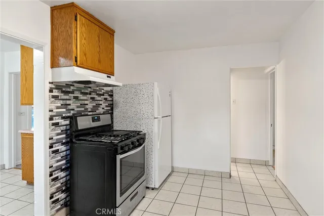 a kitchen with a cabinets and window