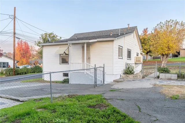 a view of a park with a tree