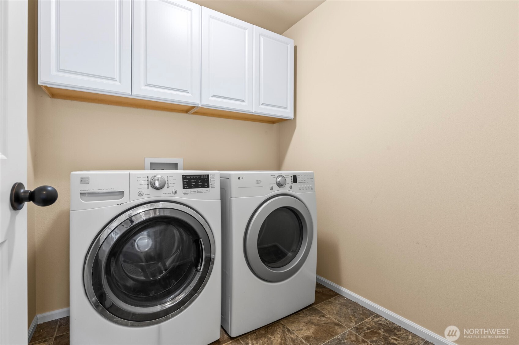1408 Daffodil Avenue Northeast Orting, WA 98360 - Photo 27 of 37 a utility room with dryer and washer