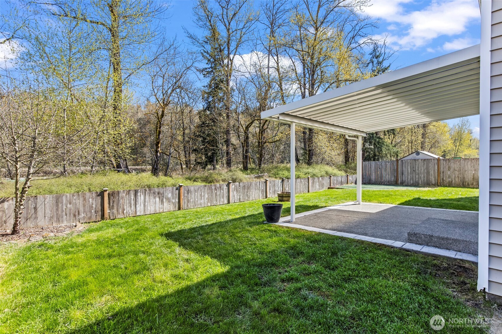 1408 Daffodil Avenue Northeast Orting, WA 98360 - Photo 28 of 37 a view of a yard with a slide
