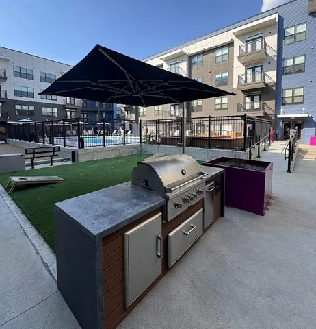 a view of a patio with couches table and chairs