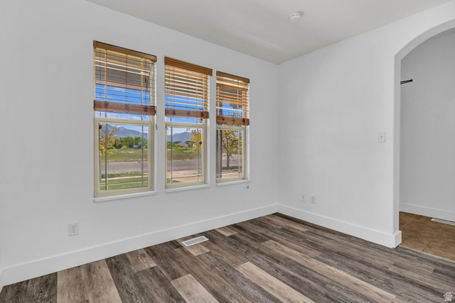 1836 West 800 North Mapleton, UT 84663 - Photo 4 of 38 Interior space featuring wood-finish flooring, white walls, and bright white trim