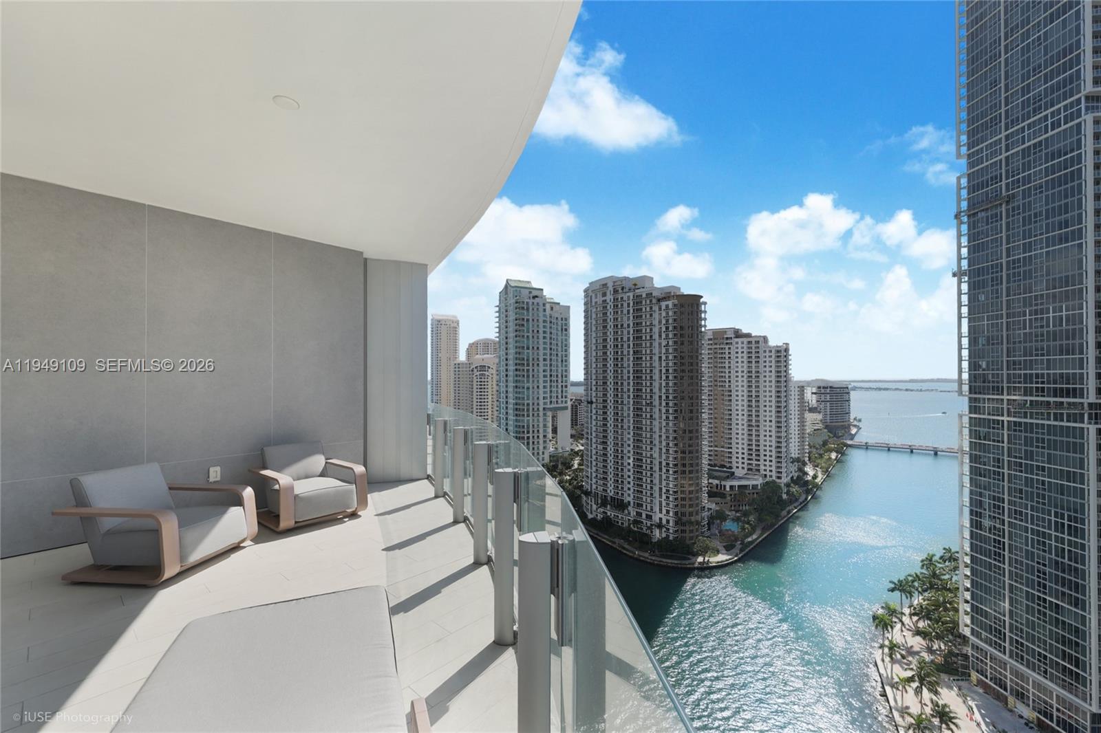 300 Biscayne Blvd Way, Unit 2307W Miami, FL 33131 - Photo 12 of 22 a view of a balcony with chairs