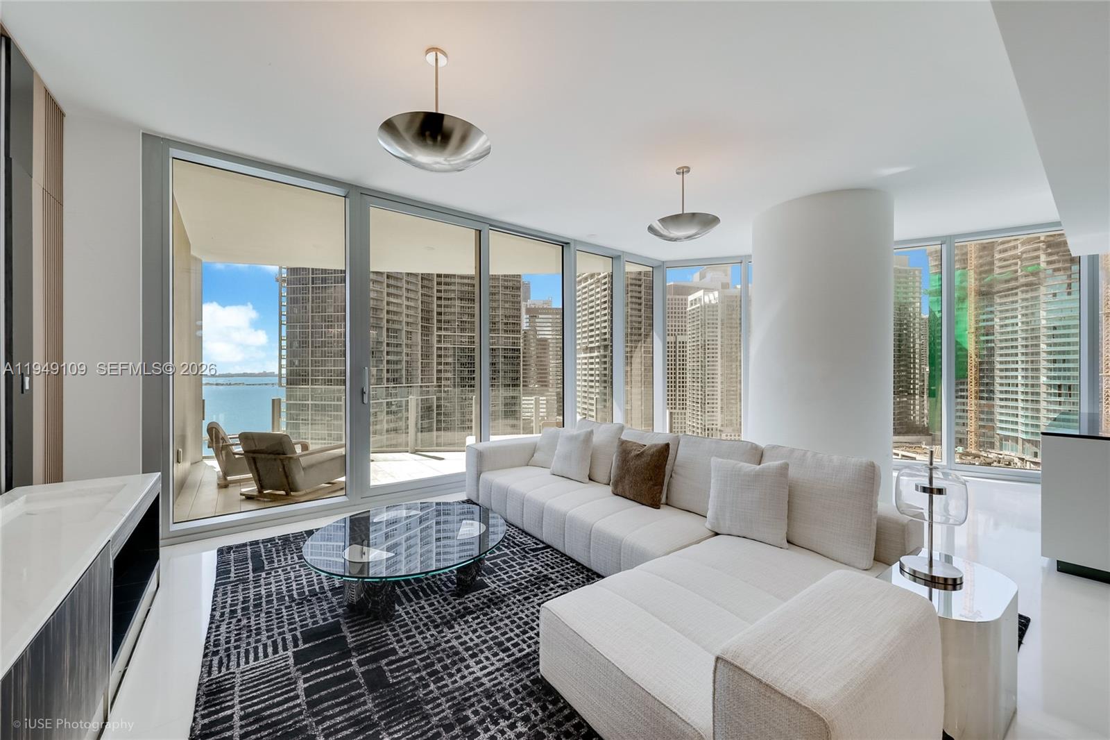 300 Biscayne Blvd Way, Unit 2307W Miami, FL 33131 - Photo 6 of 22 a living room with furniture and a large window