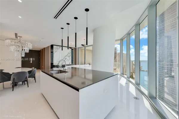 a kitchen with counter top space and a sink