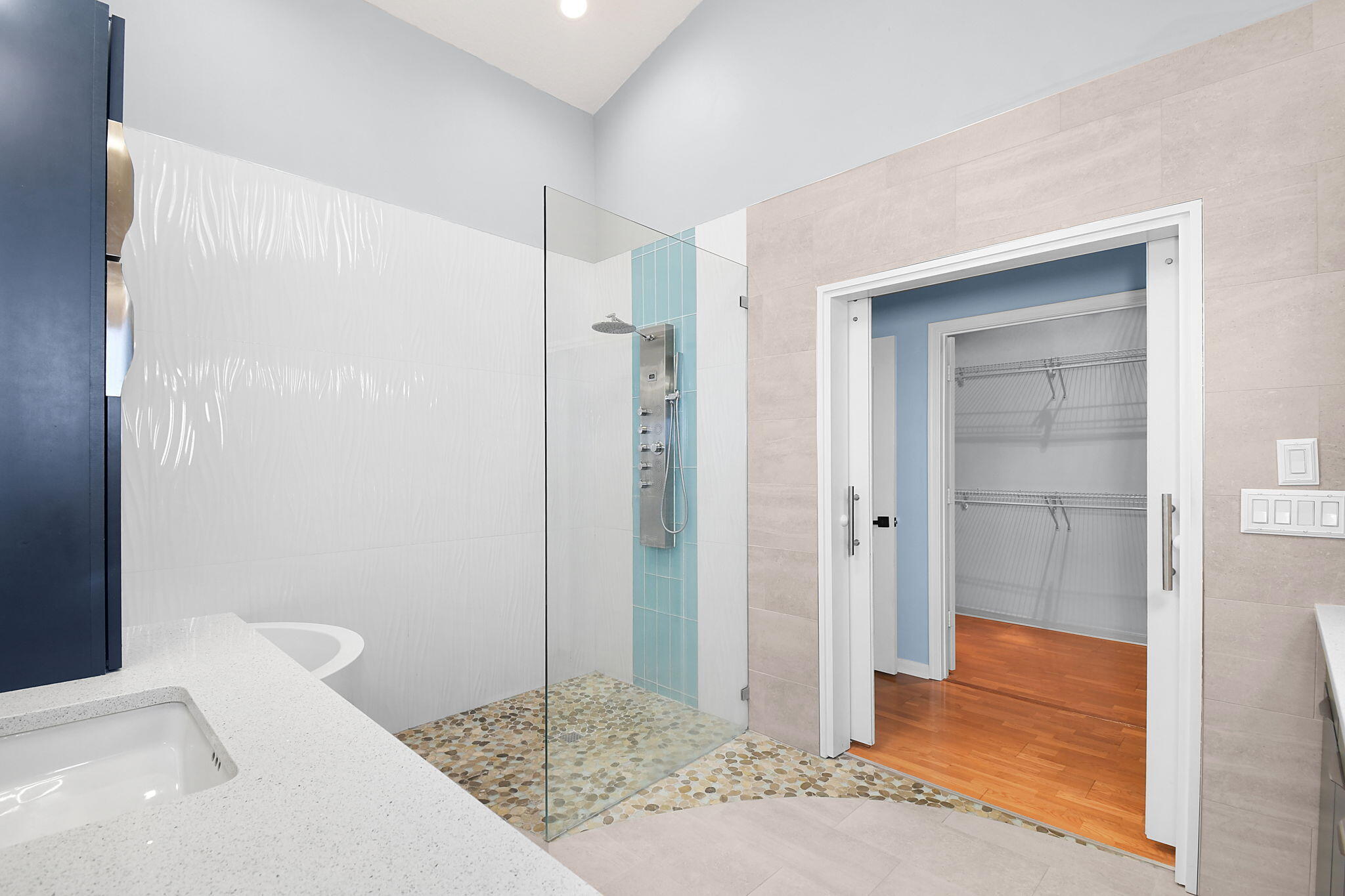1959 Northwest Marsh Rabbit Lane Jensen Beach, FL 34957 - Photo 27 of 46 Primary Bathroom with Walk-in Shower