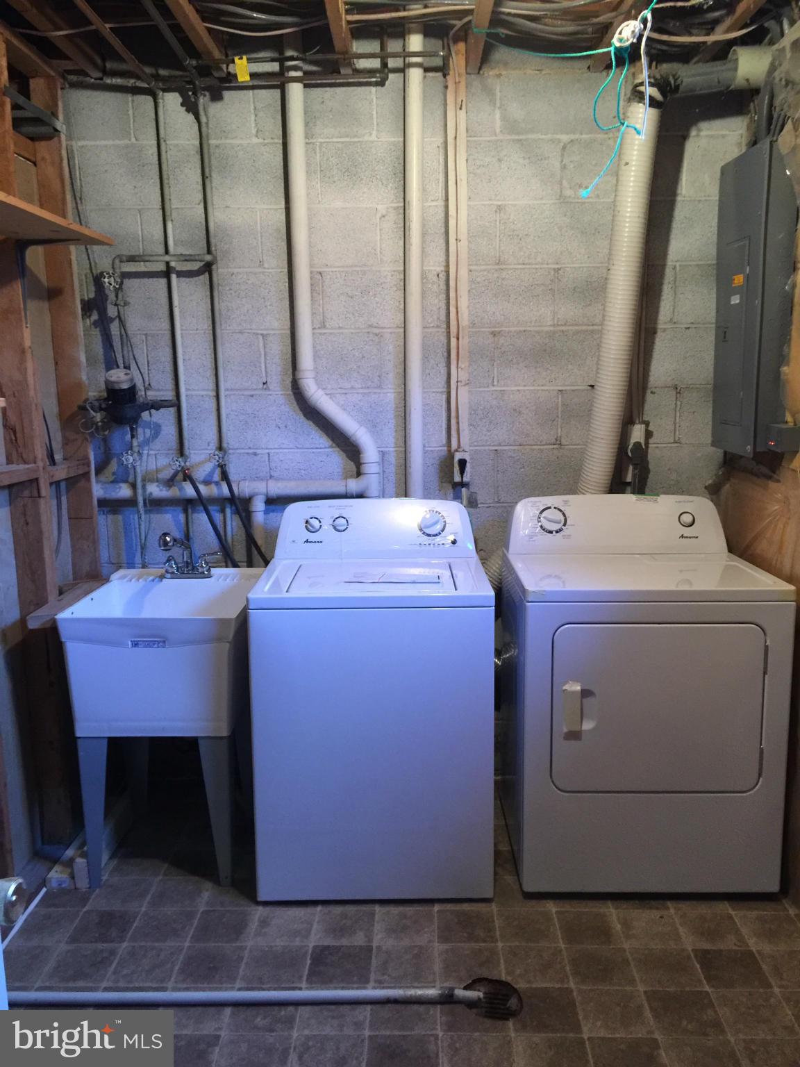 7050 Leestone Street Springfield, VA 22151 - Photo 22 of 24 a utility room with dryer and washer