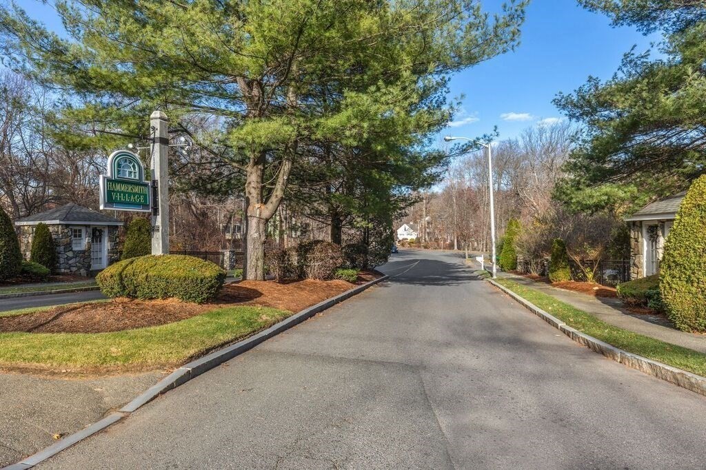 71 Hammersmith Drive Saugus, MA 01906 - Photo 1 of 41 a house with trees in the background