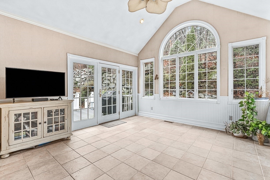 71 Hammersmith Drive Saugus, MA 01906 - Photo 16 of 41 a view of an empty room with a flat screen tv