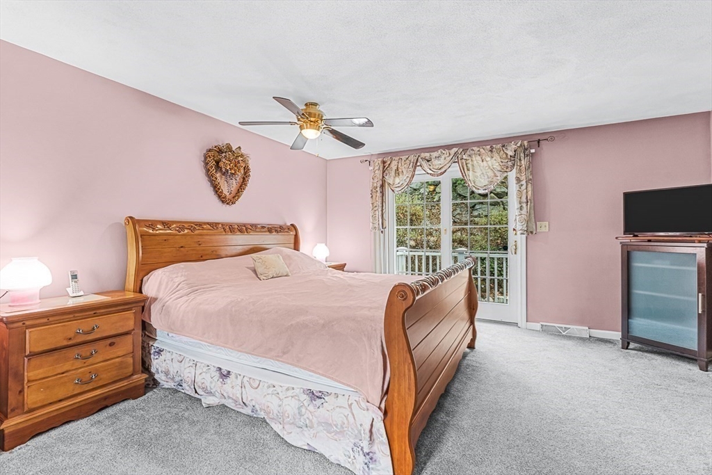 71 Hammersmith Drive Saugus, MA 01906 - Photo 20 of 41 a bedroom with a bed and a window