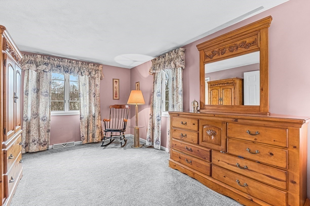71 Hammersmith Drive Saugus, MA 01906 - Photo 24 of 41 a living room with furniture and a window