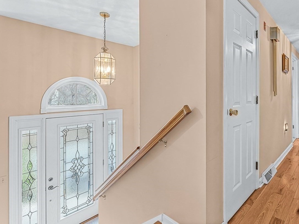 71 Hammersmith Drive Saugus, MA 01906 - Photo 3 of 41 a view of a hallway with windows and entryway