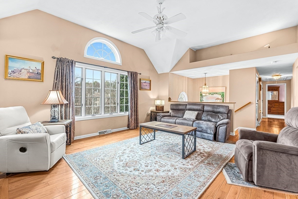 71 Hammersmith Drive Saugus, MA 01906 - Photo 4 of 41 a living room with furniture and a large window