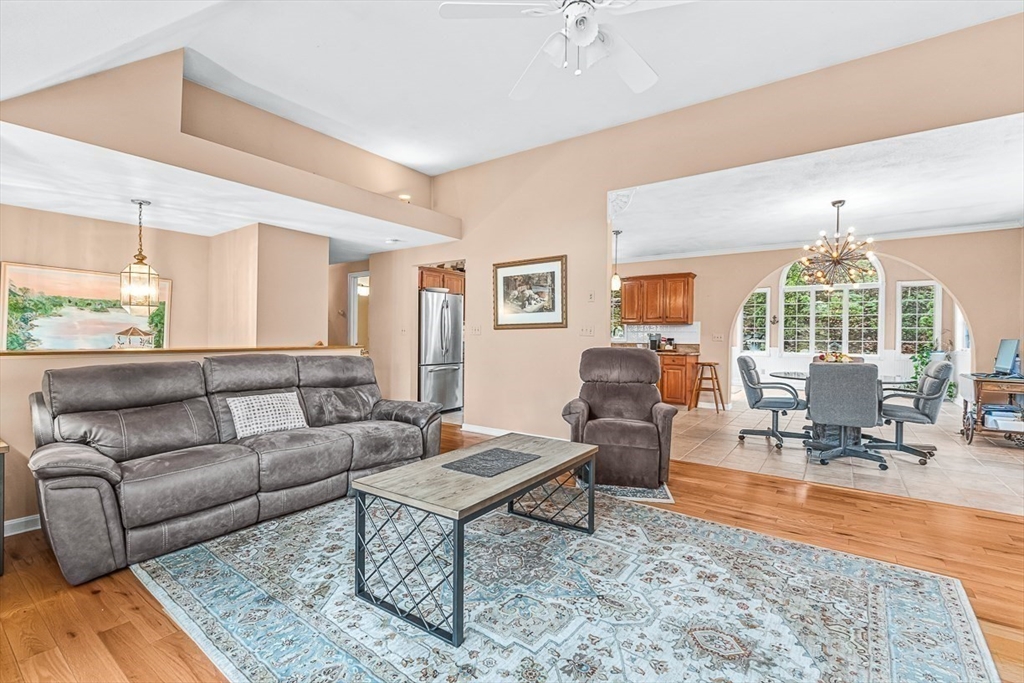 71 Hammersmith Drive Saugus, MA 01906 - Photo 7 of 41 a living room with furniture and a wooden floor