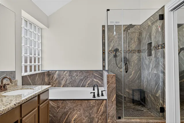 a bathroom with a sink a vanity and a mirror