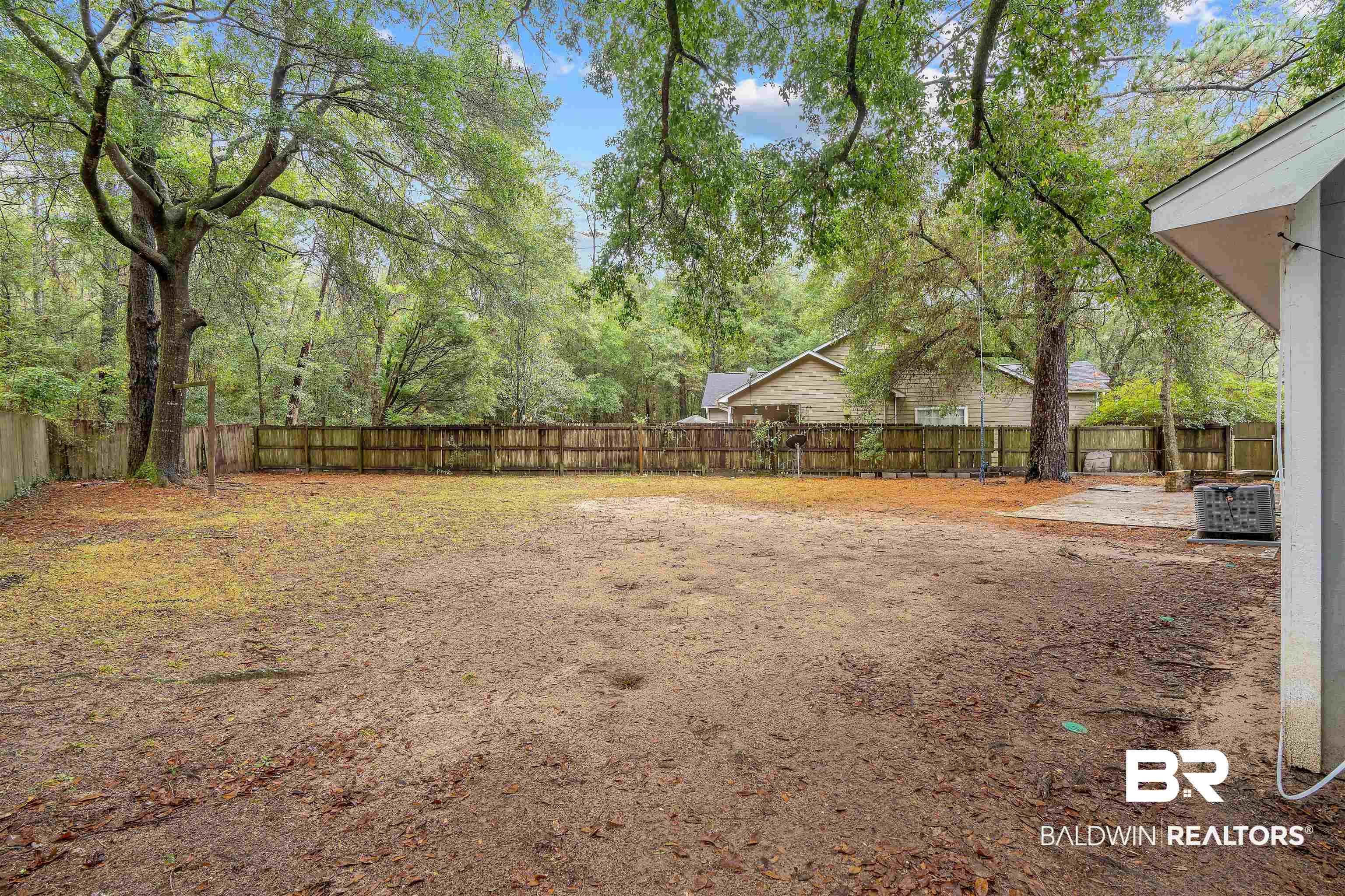 159 Montclair Loop Daphne, AL 36526 - Photo 14 of 18 Fenced backyard featuring a patio