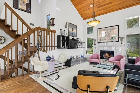 a outdoor living and dining room with furniture