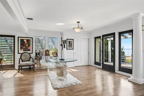 a view of a livingroom with couch and kitchen view
