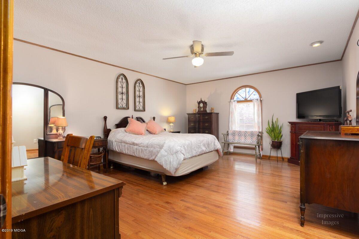 2527 Old Jackson Road Locust Grove, GA 30248 - Photo 14 of 29 a bedroom with a bed and a flat screen tv