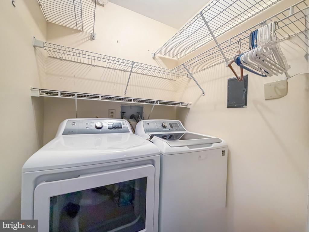 72307 Delaire Landing Road, Unit 307 Philadelphia, PA 19114 - Photo 25 of 39 Convenient 1st Floor Laundry w/ Shelving & Storage
