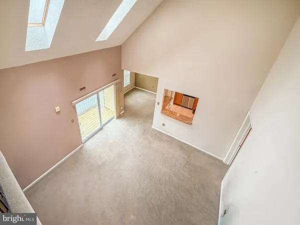 a view of a livingroom with an entryway