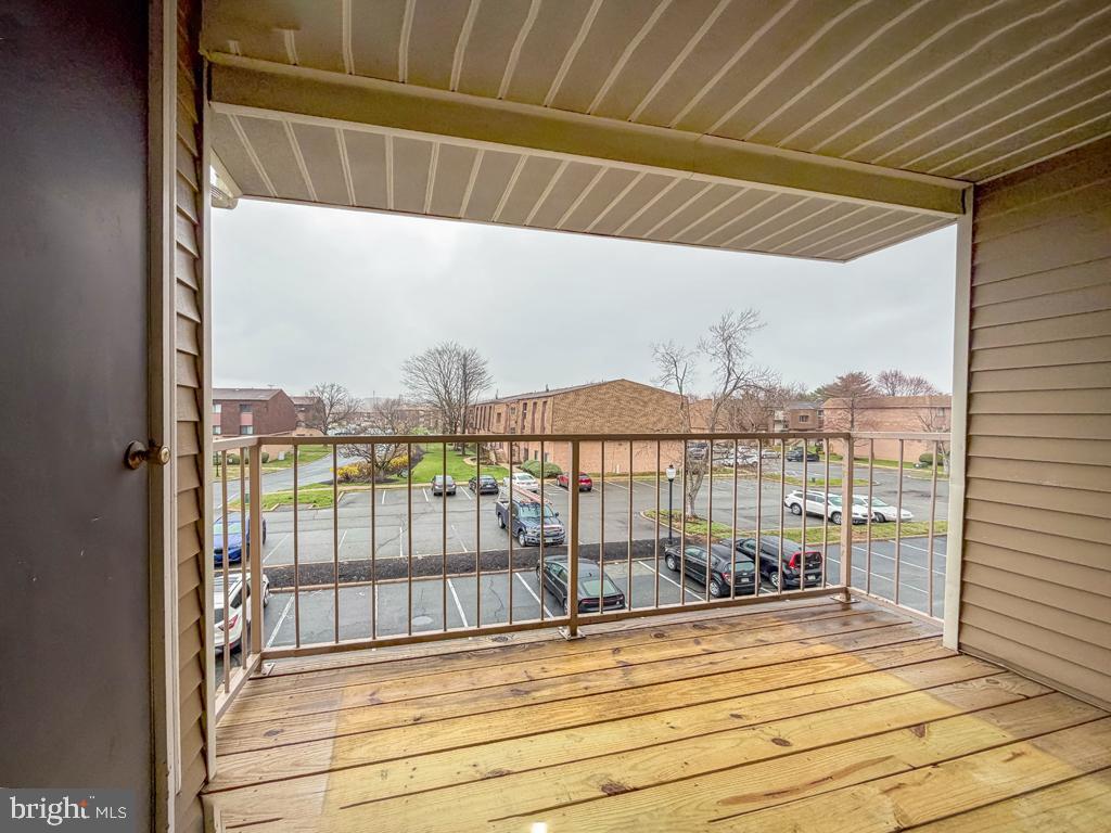 72307 Delaire Landing Road, Unit 307 Philadelphia, PA 19114 - Photo 32 of 39 Balcony Off Living Room with Newer Decking