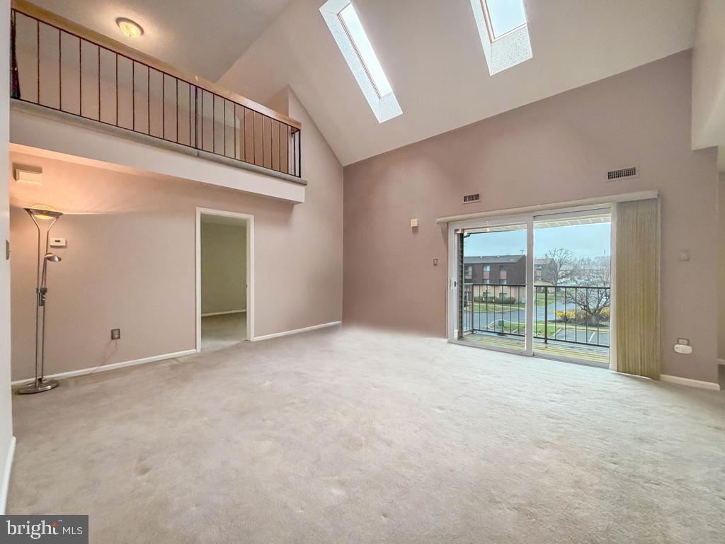 72307 Delaire Landing Road, Unit 307 Philadelphia, PA 19114 - Photo 8 of 39 Living Rm w/Sliding Glass Doors Leading to Balcony