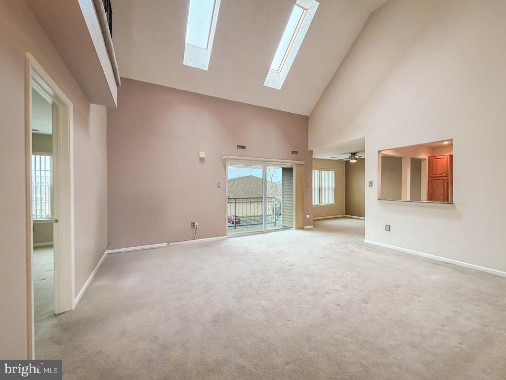 72307 Delaire Landing Road, Unit 307 Philadelphia, PA 19114 - Photo 9 of 39 Living Room with Newer Skylight