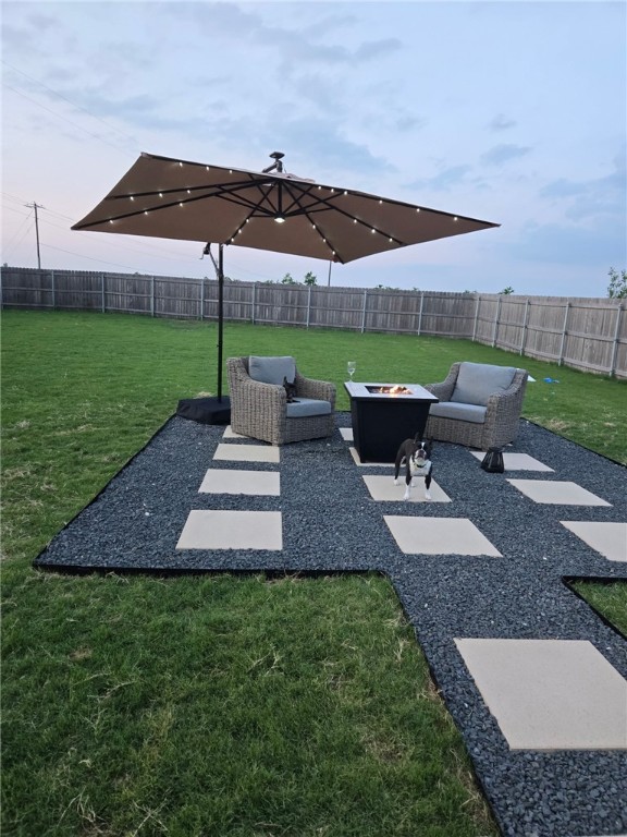 518 Alamo Drive McGregor, TX 76657 - Photo 21 of 41 a view of a backyard with sitting area