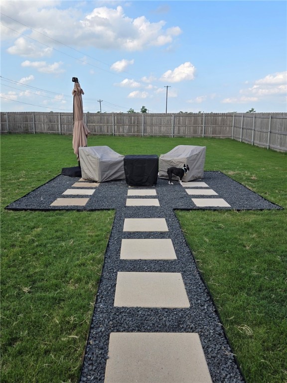 518 Alamo Drive McGregor, TX 76657 - Photo 23 of 41 a view of a garden with furniture