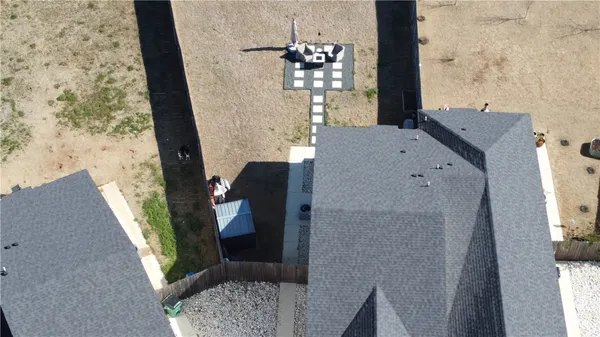 a view of roof deck with patio