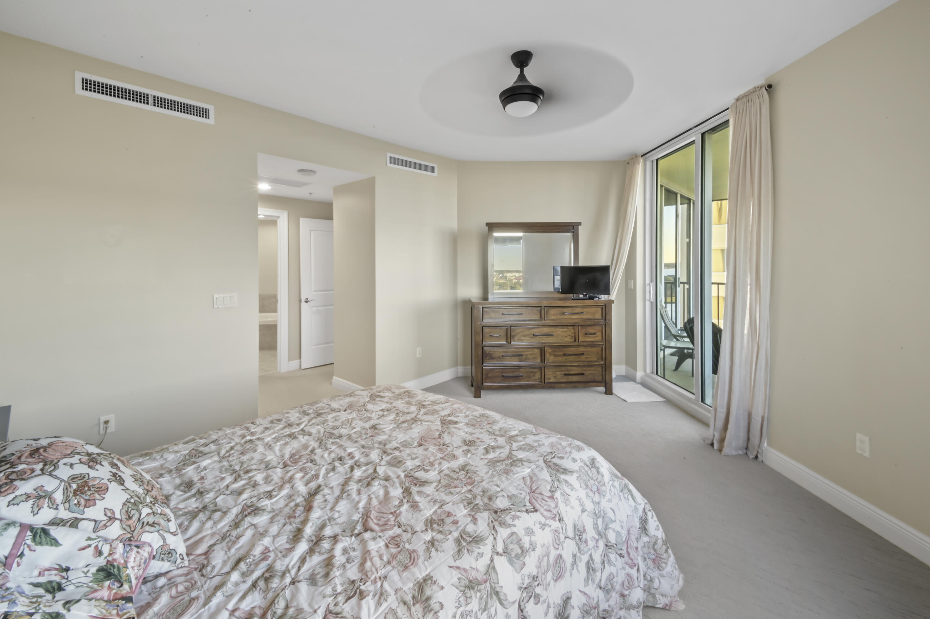 608 Lost Key Drive, Unit 801C Perdido Key, FL 32507 - Photo 11 of 43 a bedroom with a bed and a television