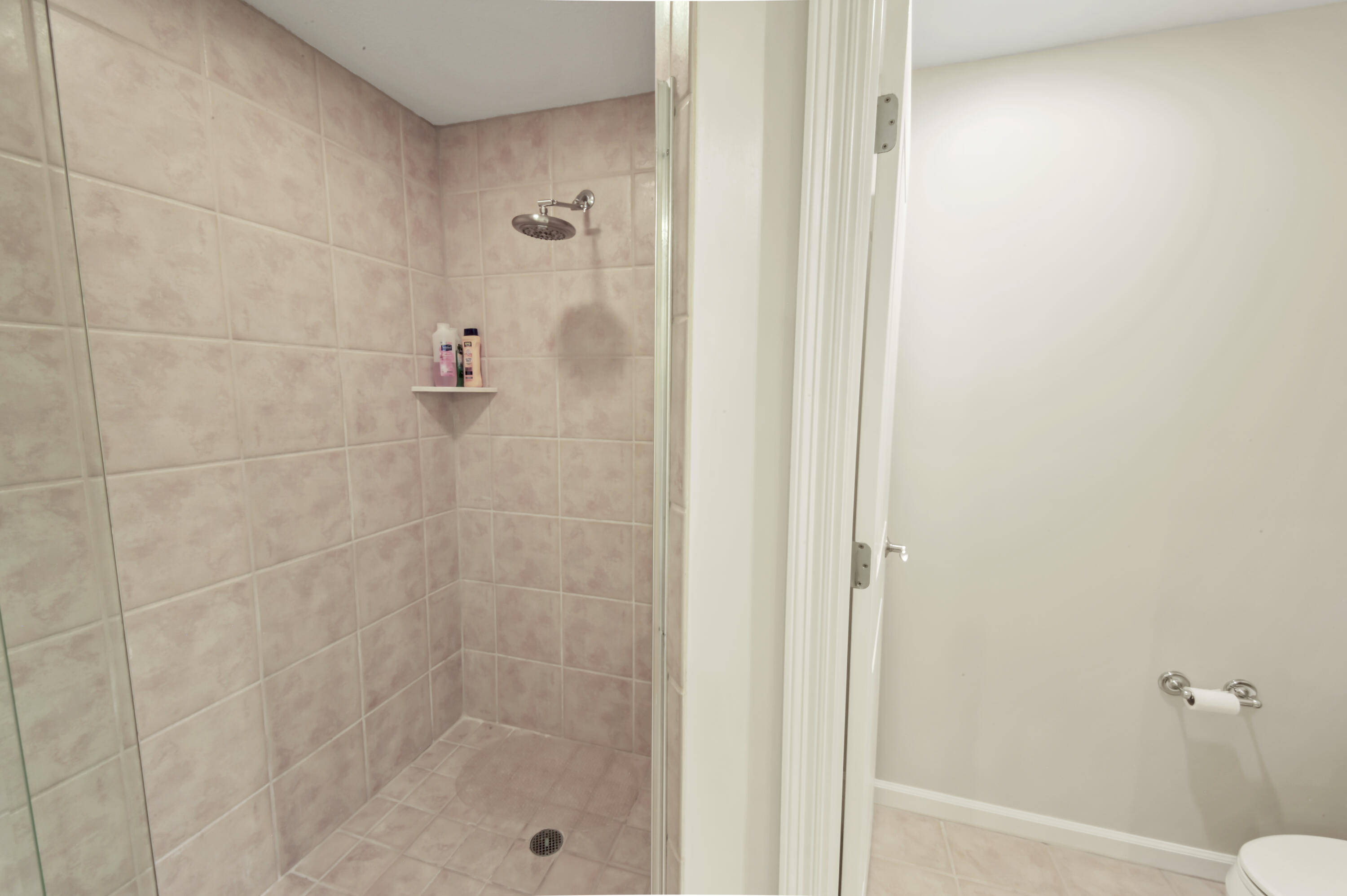 608 Lost Key Drive, Unit 801C Perdido Key, FL 32507 - Photo 13 of 43 a bathroom with a shower
