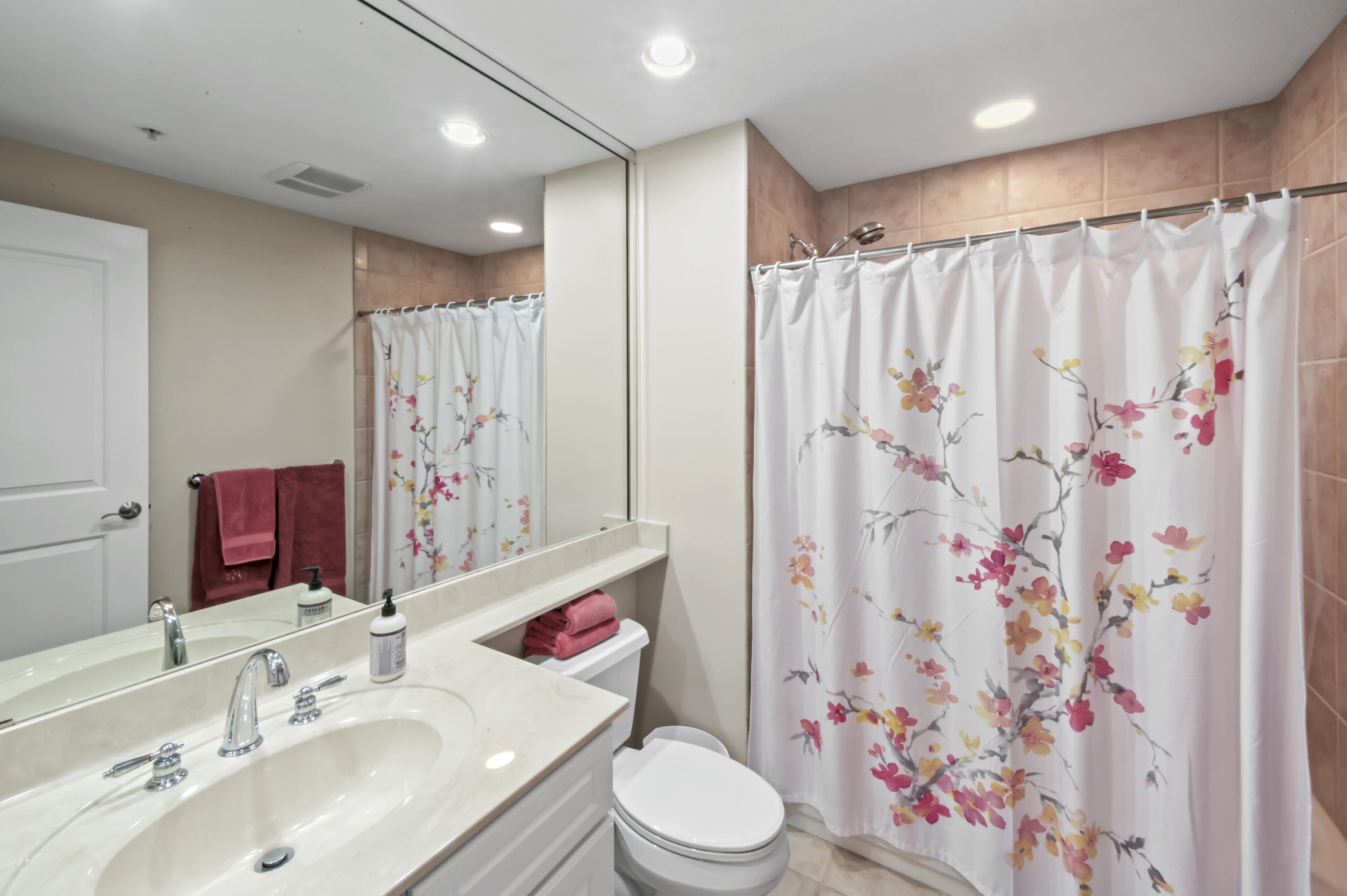 608 Lost Key Drive, Unit 801C Perdido Key, FL 32507 - Photo 17 of 43 a bathroom with a sink toilet and shower