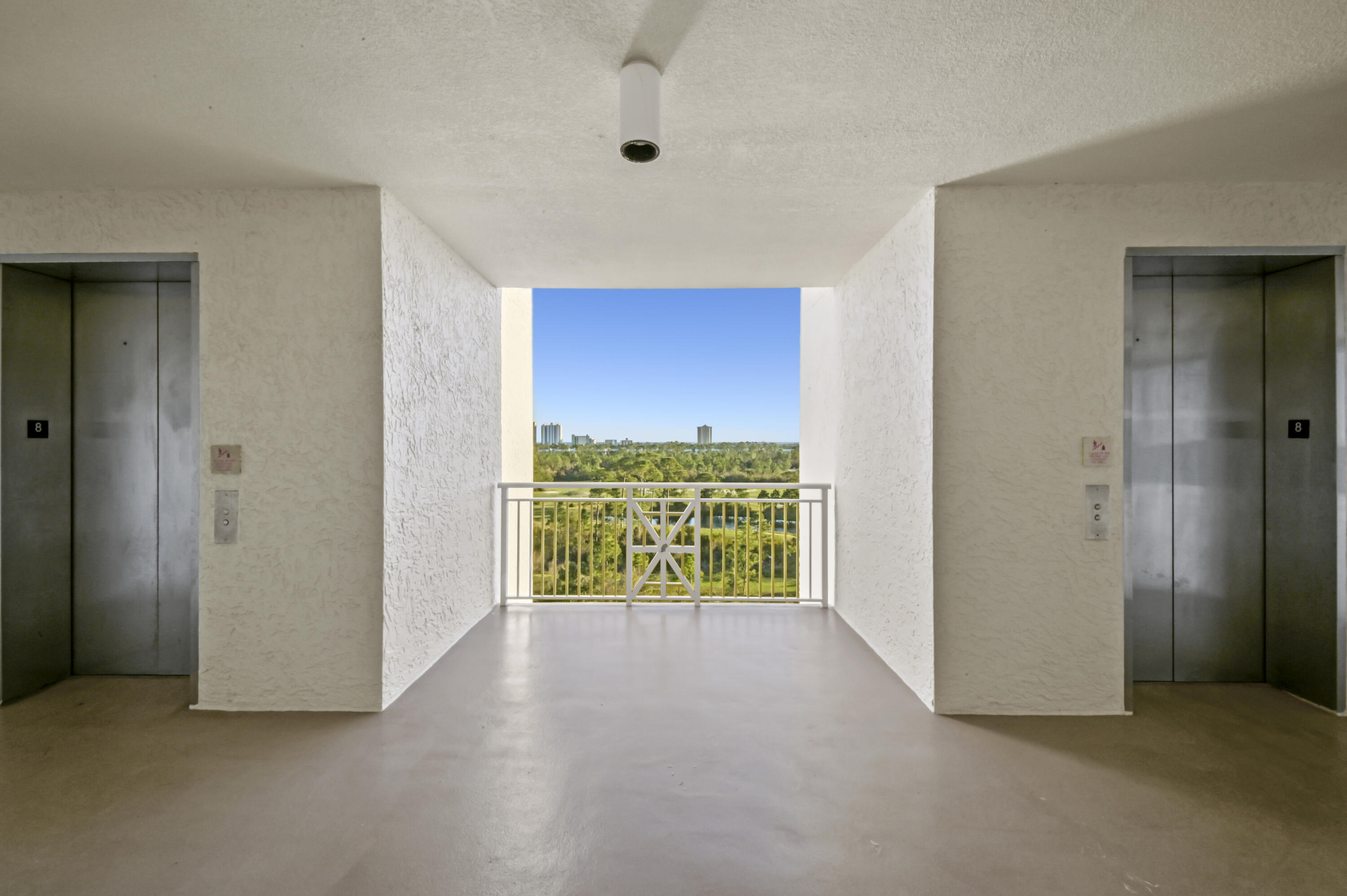 608 Lost Key Drive, Unit 801C Perdido Key, FL 32507 - Photo 30 of 43 an empty room with an entryway and a window