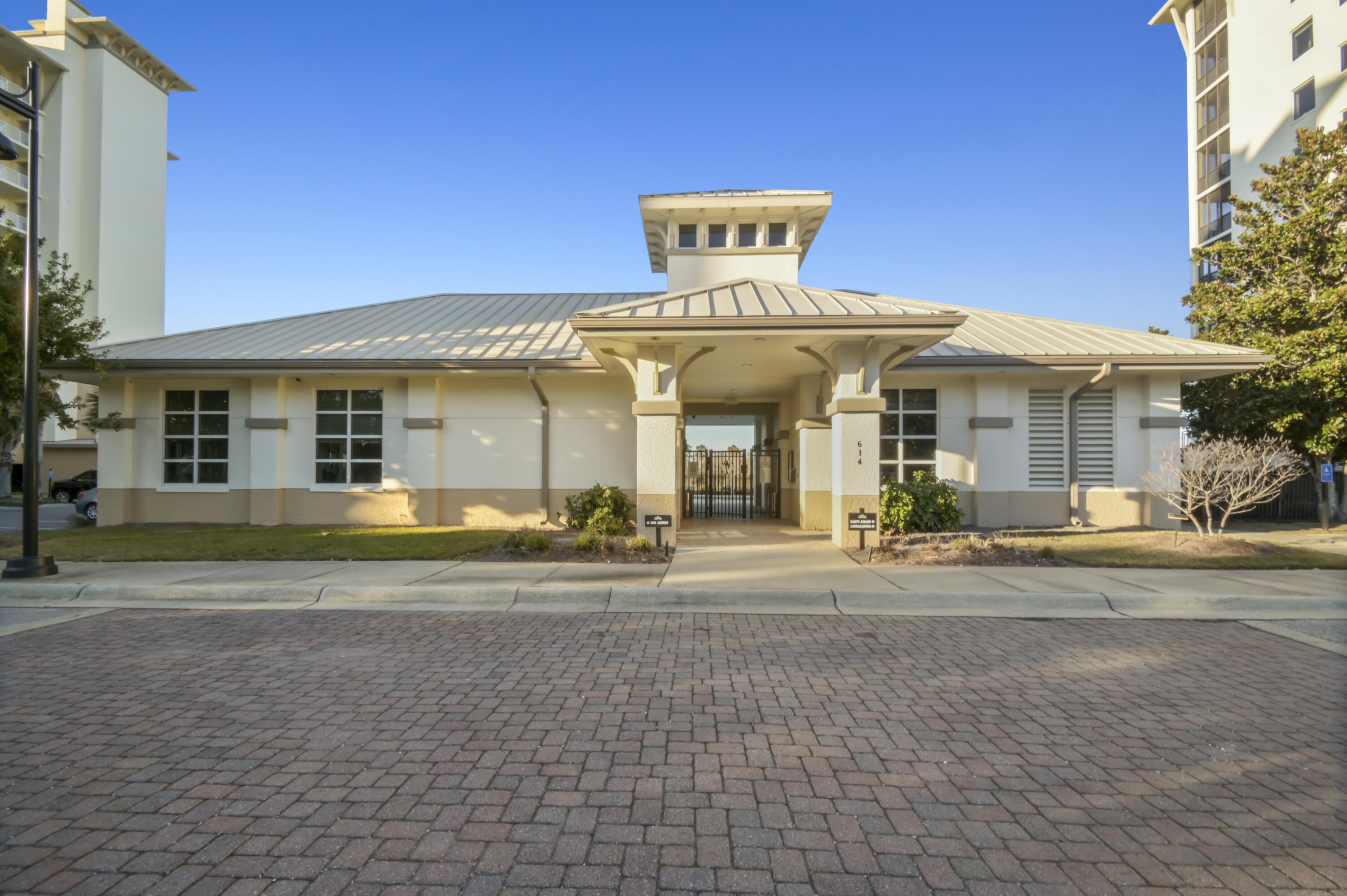 608 Lost Key Drive, Unit 801C Perdido Key, FL 32507 - Photo 34 of 43 a front view of a house with a yard