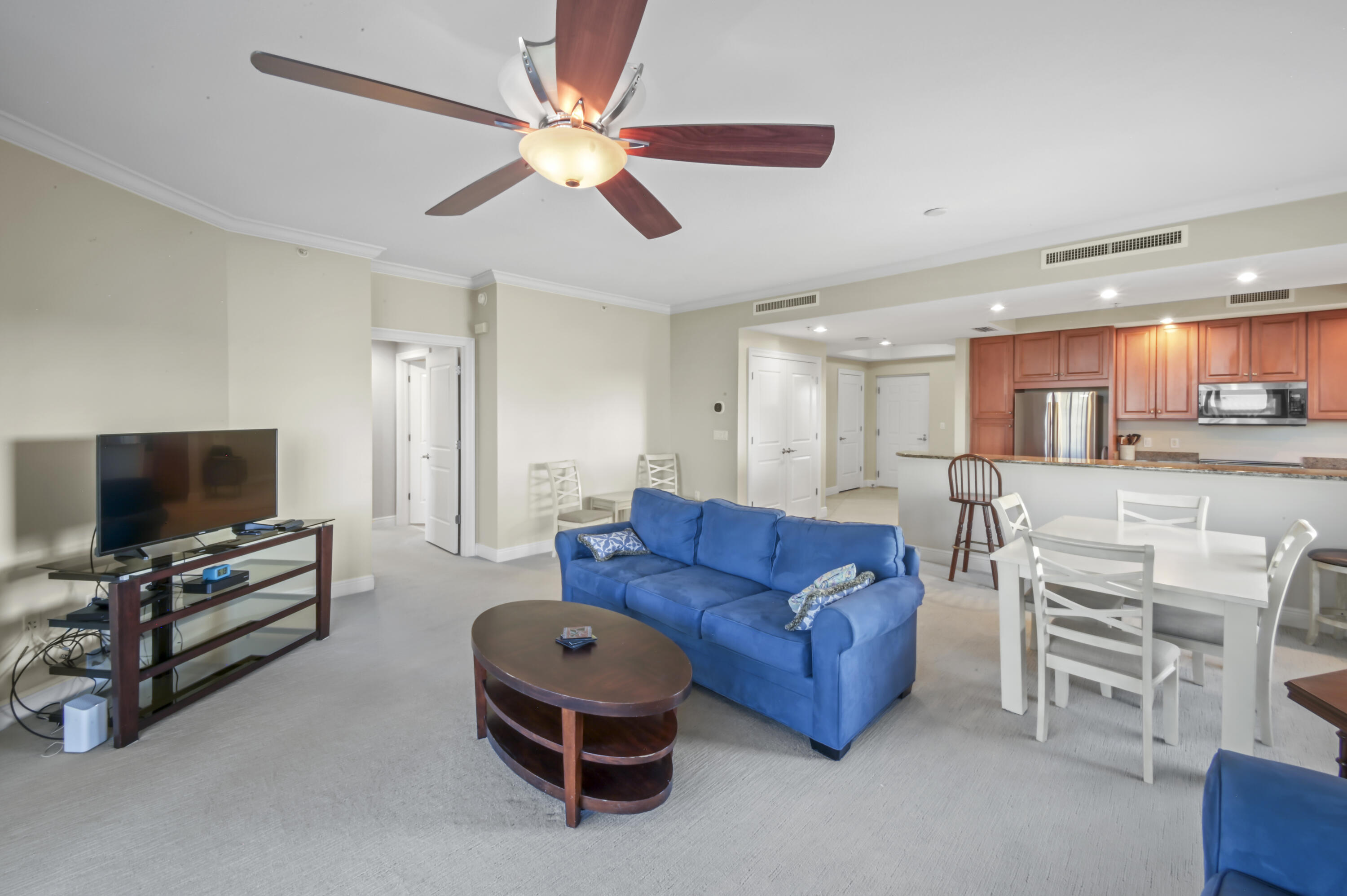 608 Lost Key Drive, Unit 801C Perdido Key, FL 32507 - Photo 8 of 43 a living room with furniture and a flat screen tv