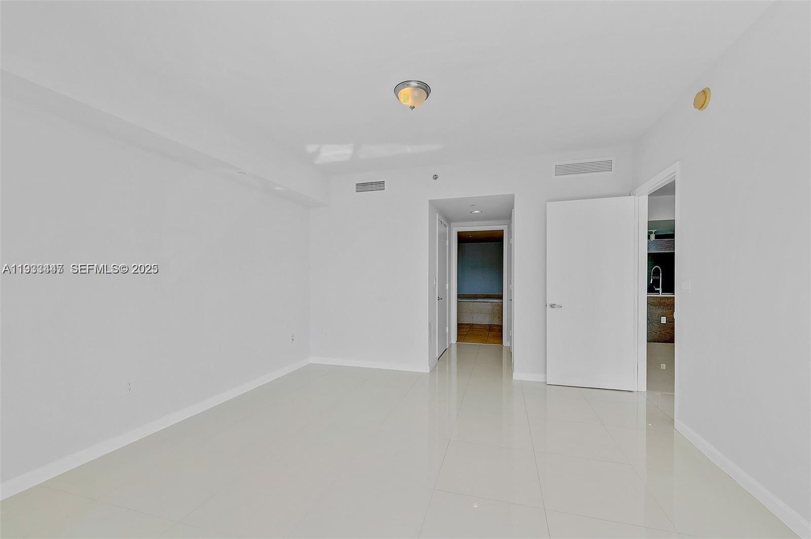 495 Brickell Avenue, Unit 2103 Miami, FL 33131 - Photo 23 of 37 a view of an empty room