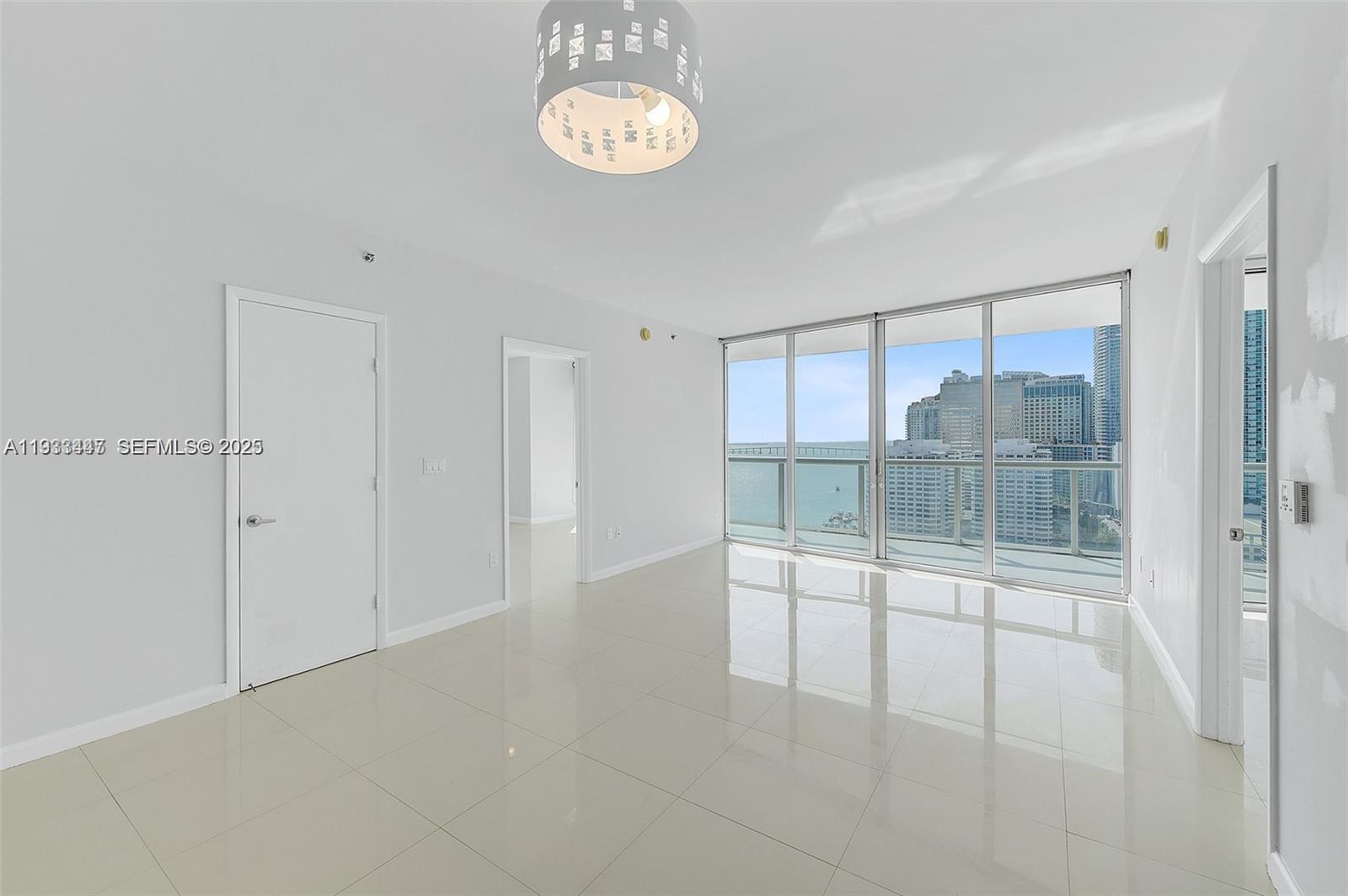 495 Brickell Avenue, Unit 2103 Miami, FL 33131 - Photo 8 of 37 a view of an empty room with a window