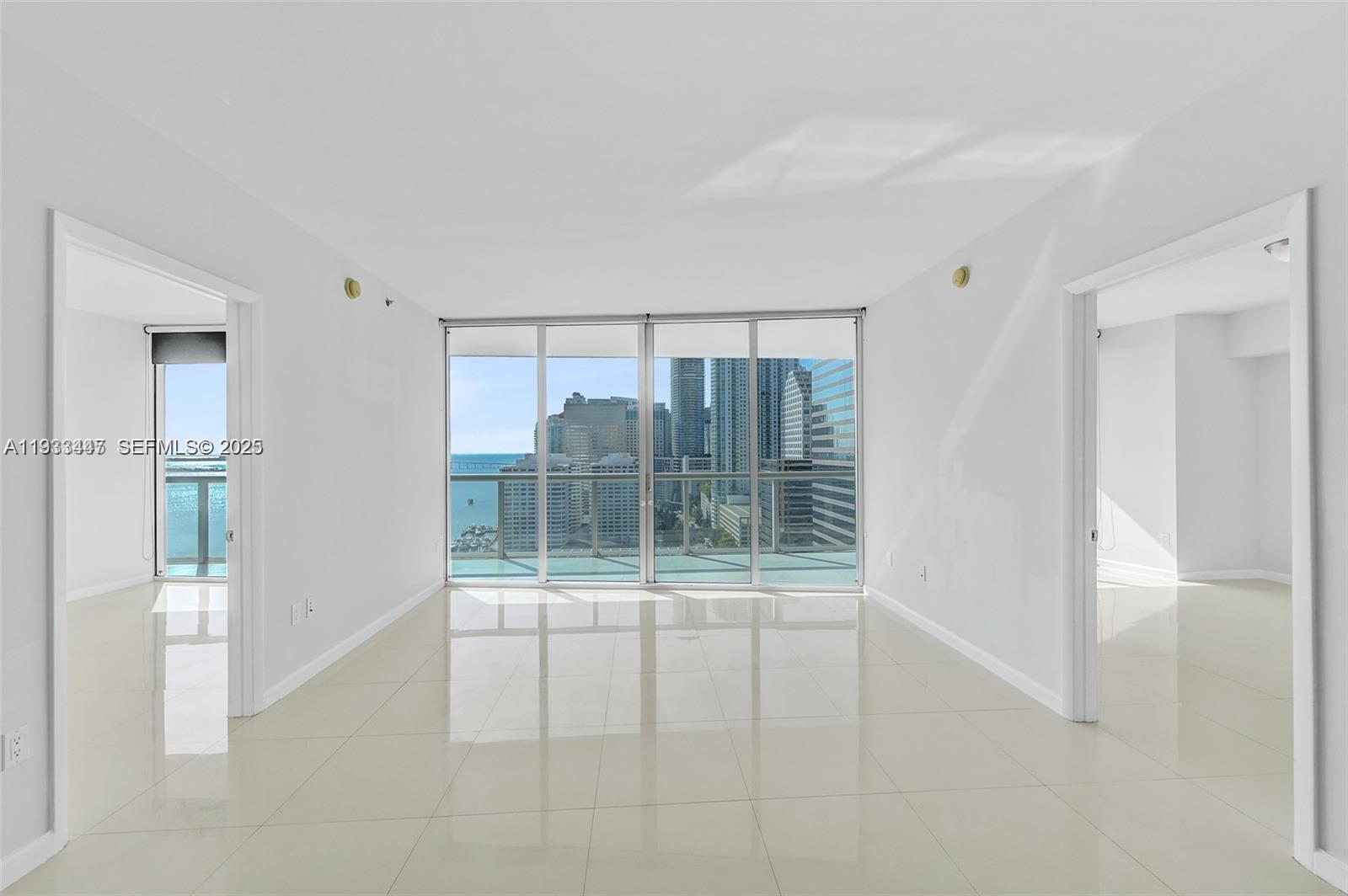 495 Brickell Avenue, Unit 2103 Miami, FL 33131 - Photo 9 of 37 a view of an empty room with a window